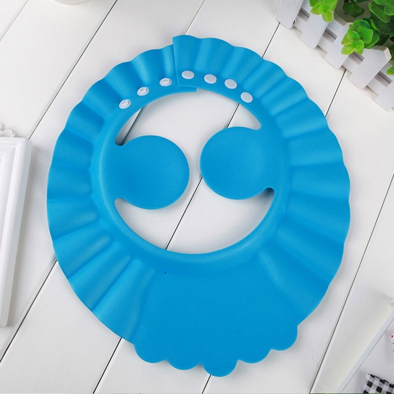 Visière chapeau pour douche bébé I ShampooCap™ - Bébé aux 4 saisons